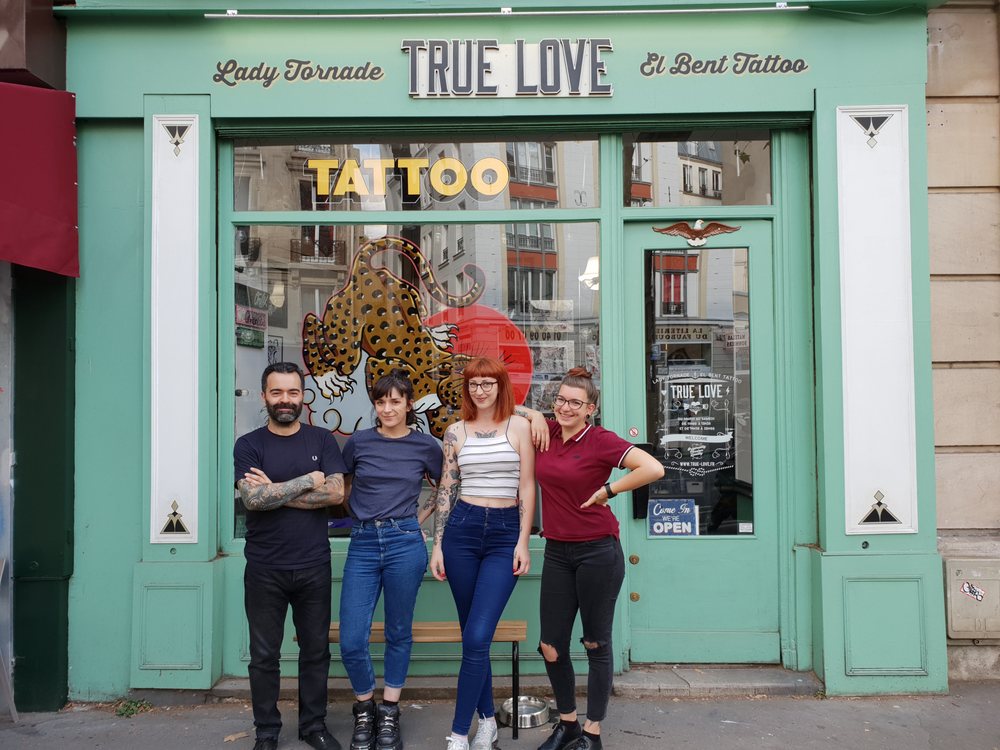 Tattoo arrow on red door Kids love ink Tattoo studio Cheshire St  Bethnal Green London Stock Photo  Alamy