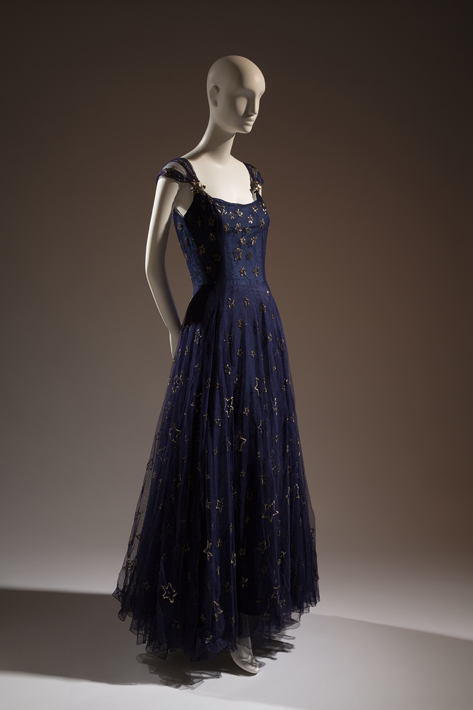 Gabrielle Coco Chanel, Etoiles navy blue tulle and sequin evening dress  1937. Lent by Beverley Birks. ©The Museum of FIT – A Shaded View on Fashion
