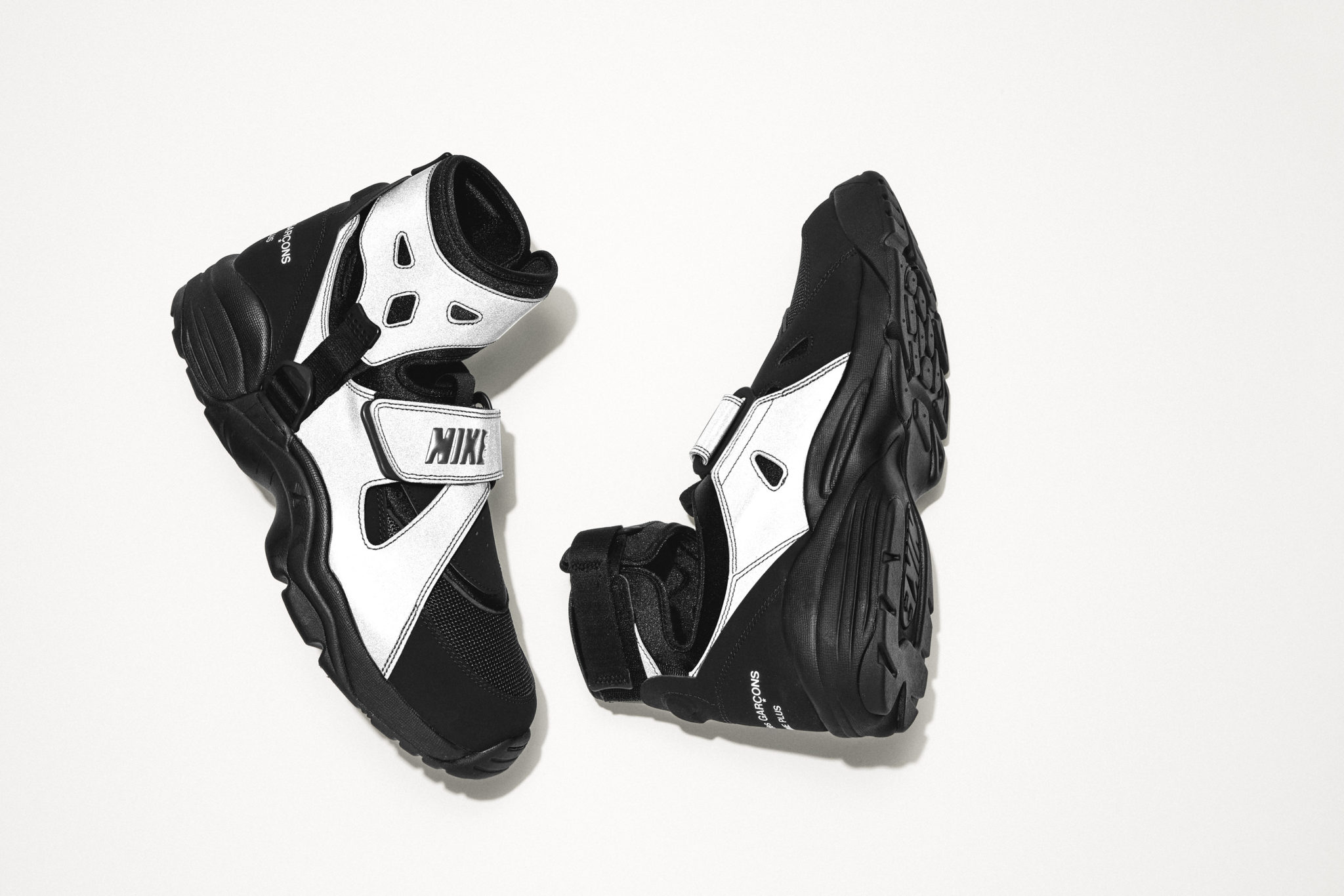 nike carnivore comme des garcons
