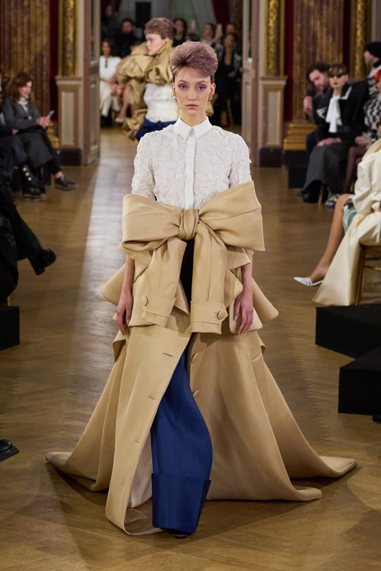 Chandeliers and Salons  Couture; craft and client, the keys to the season.  Text by Tony Glenville  A Shaded View on Fashion