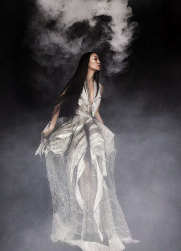Yiqing Yin