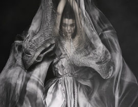Yiqing Yin