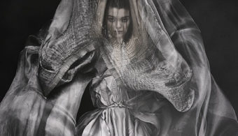Yiqing Yin