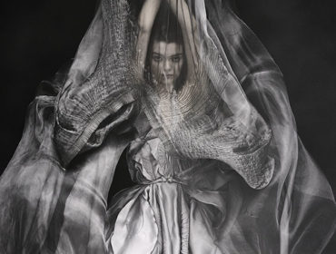 Yiqing Yin
