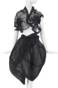 A Comme des Garçons black polyester ensemble, ‘Body Meets Dress – Dress Meets Body’ collection, Spring-Summer 1997. ©Kerry Taylor Auctions